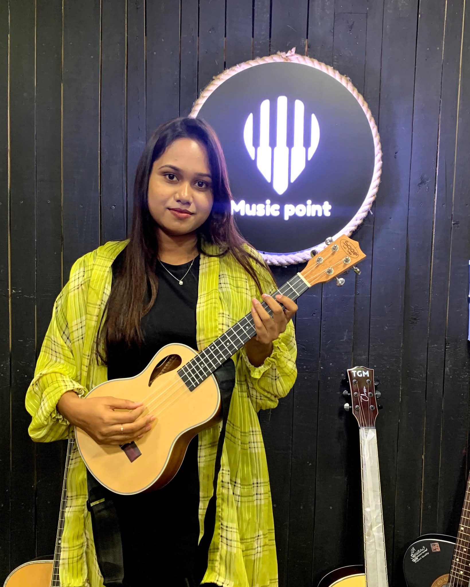 Music Point Customer with Ukulele at Music Point