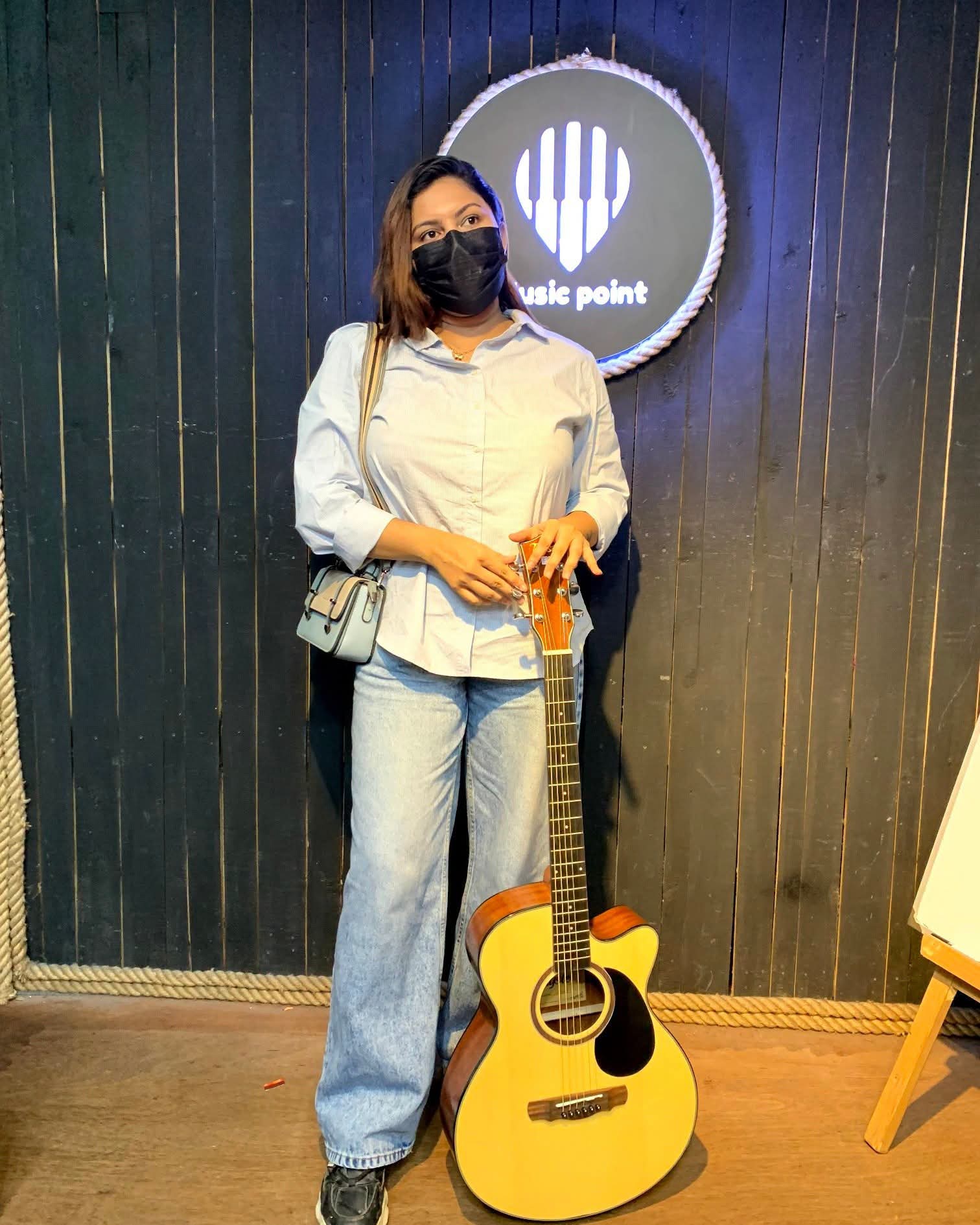Lima Ahsan with Acoustic Guitar at Music Point