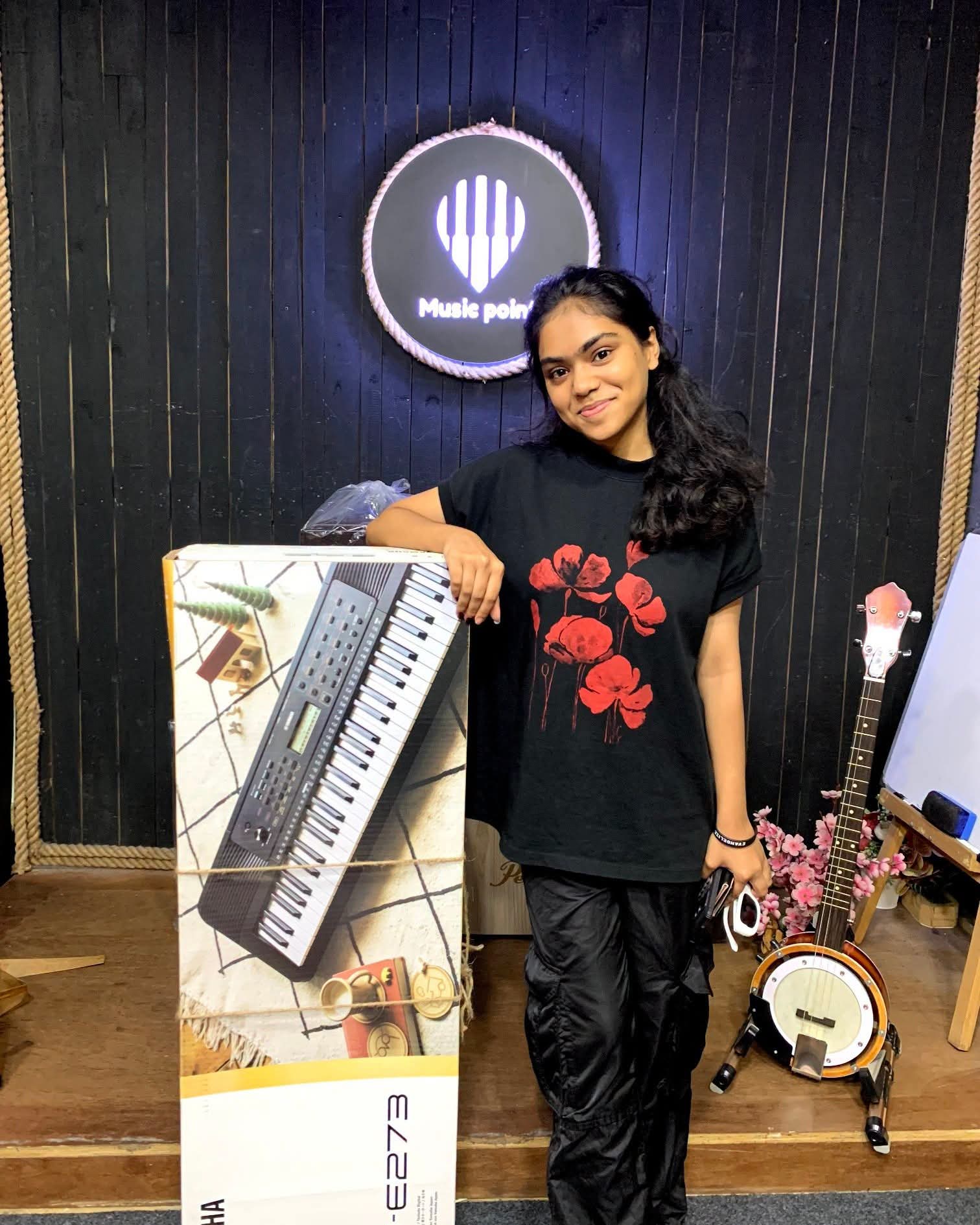 Music Point Customer with Keyboard at Music Point